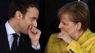 Macron e Angela Merkel exigem solução pacífica no leste da Ucrânia